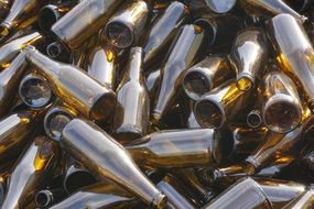 pile of Brown Glass Beer Bottles