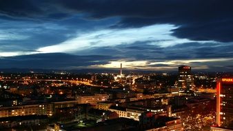 panorama of a night city at dusk