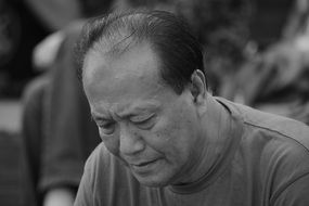 black and white portrait of a man of Asian appearance