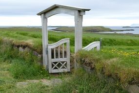 wooden door in a picturesque meadow in Iceland