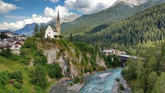 church on a rock by the river