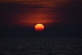 bright sun in the evening dark sky