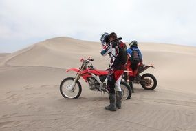 Bikers in a desert