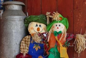 stuffed animals stand on a farm