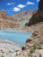 river with blue water among the rocks