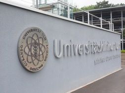 Ulm University logo on wall, germany