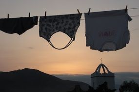 Clothes on line in view of Summer Sunset