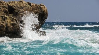 ocean waves breaking on the rocks