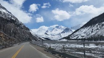 mountain road among ice fields