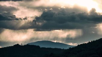 Clouds and Storm in Mountains scene