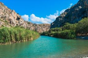 turquoise river in the mountains of crete