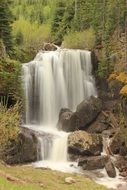huge stones on a natural waterfall