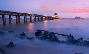 night illumination of the long bridge in Thailand