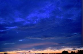 Beautiful sunset in the clouds on the landscape