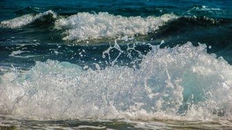 spraying ocean waves with foam