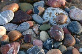 colourful Round Pebbles in the beach closeup