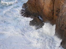 waves of the atlantic ocean near the cliff