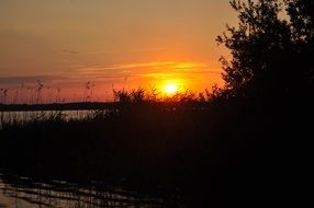 orange sunset over Plauer lake, Germany