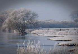 calm winter landscape by the river