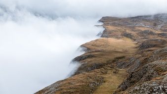 dense fog over the dolomites in south tyrol