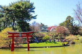 red arch on the pond in japanese park