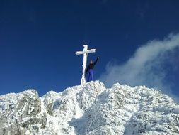 tourist with a chair on top of a glacier