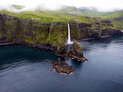 beautiful photo of a waterfall on the Tanaga island