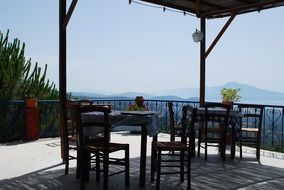 terrace with chairs and tables