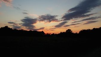 poland village sunset trees outlines view