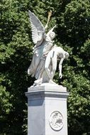 angel sculpture in the park on a sunny day