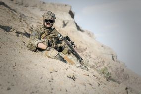 military on sand dune