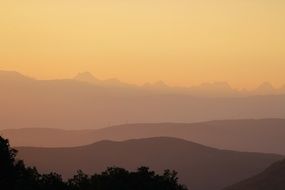 orange sky over the mountains during sunrise