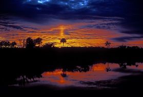 sunrise in the clouds over the everglades national park