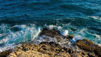 sea waves beat against the rocks in Cyprus