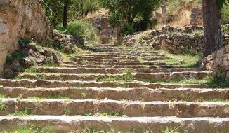 Antique stone stairs in village, greece