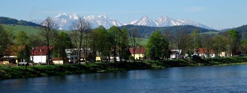 street with houses near a lake in slovakia