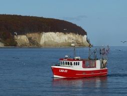 red boat on the baltic sea near of rugen island