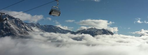 chairlift in fog in the mountains of austria