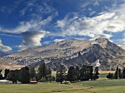 remote view from the valley to the mountains