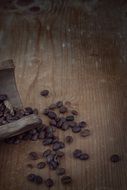 coffee beans on a wooden surface