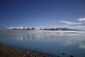 Mountain Fog over the lake