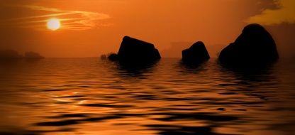 golden sunrise on the rocky beach
