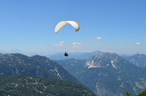 Paraglider in mountains