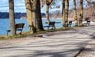 landscape of bench in the park by a lake