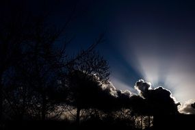 sun's rays make their way through the clouds