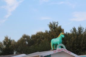 unicorn sculpture on the roof