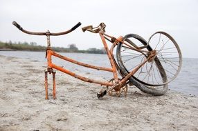 broken bike on the beach