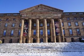 Beautiful Castle Wilhelmshöhe with the stairs in snow
