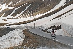 Cyclist on mountain pass, france, Col De La Bonette