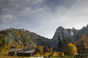 wooden hut in autumn Mountain Landscape